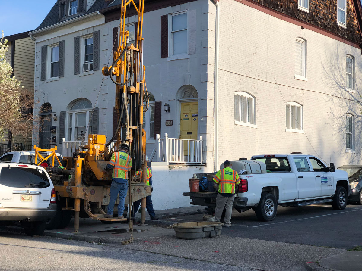 A construction crew working on a home damaged by a flood