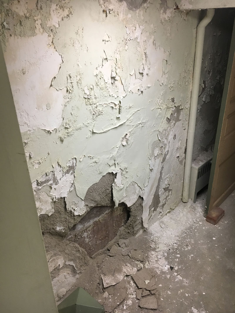 A wall damaged by a flood